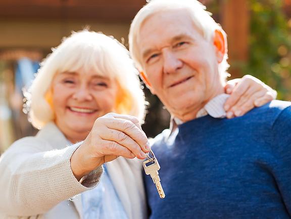 Life is just beginning. Happy senior couple bonding to each other and smiling while woman holding keys in her hand Men, Women, Couple, Heterosexual Couple, Senior Couple, Love, Loving, Romance, Married, Husband, Wife, Human Relationship, Senior Adult, Senior Women, Senior Men, Active Seniors, Aging Process, Retirement, White Hair, 60s, 70s, Concepts And Ideas, People, Confidence, Outdoors, House Moving, Recreational Pursuit, Lifestyle, Relaxation, Resting, Building Exterior, Residential Structure, Owner, New, Key, Arms Outstretched, Showing, Wellbeing, Embracing, Bonding, Smiling, Candid, Cheerful, Happiness, Expressing Positivity, Looking At Camera, Standing, Togetherness, Selective Focus